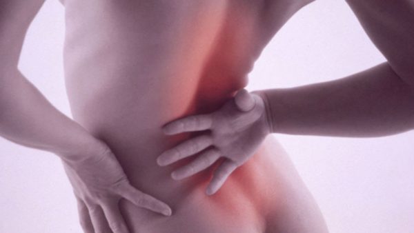 Онкология может проявляться тянущими болями внизу спины